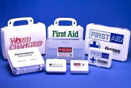 Selection of our first aid kit cases, from smaller pocket-sized kits to larger unitized cases, with custom hot stamp imprints