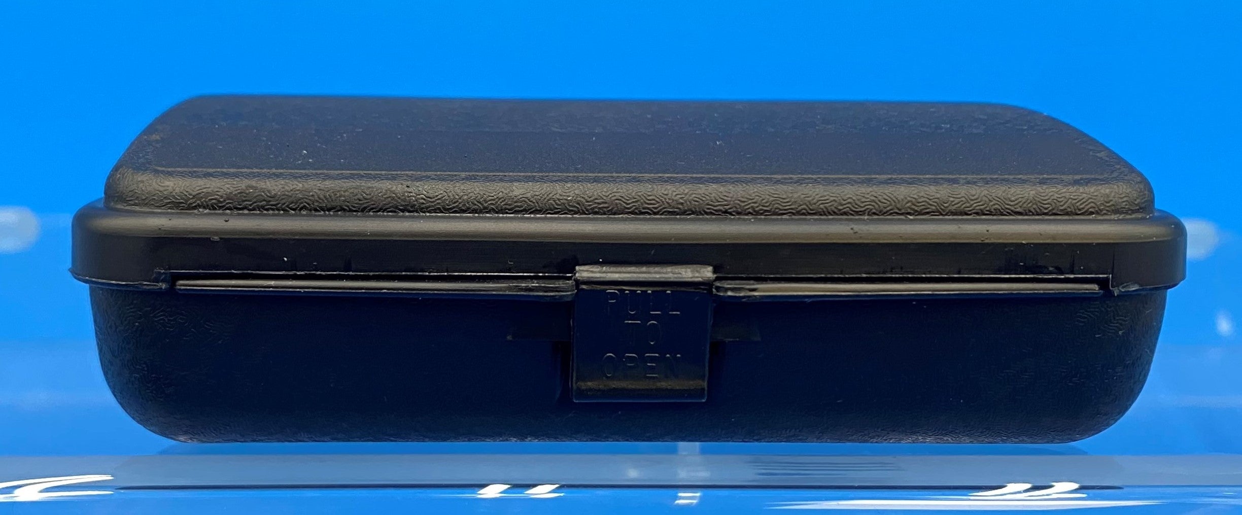 CPC case in black polypropylene, front view showing details of the latch