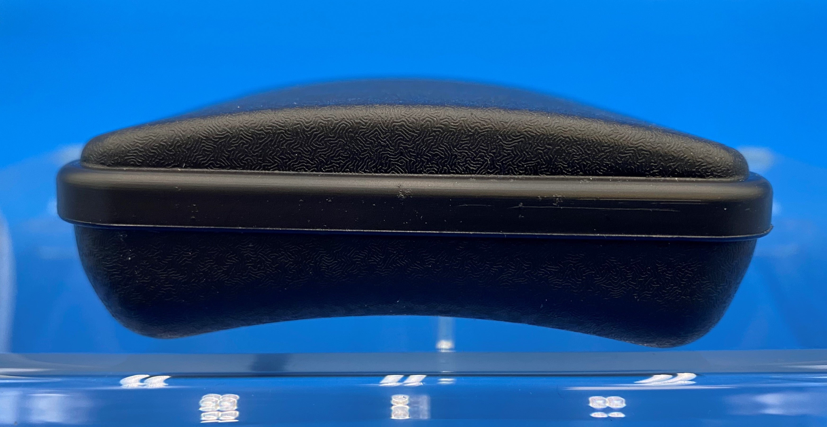 CPC Case in black polypropylene, side view showing the contour that fits nicely in a front pocket