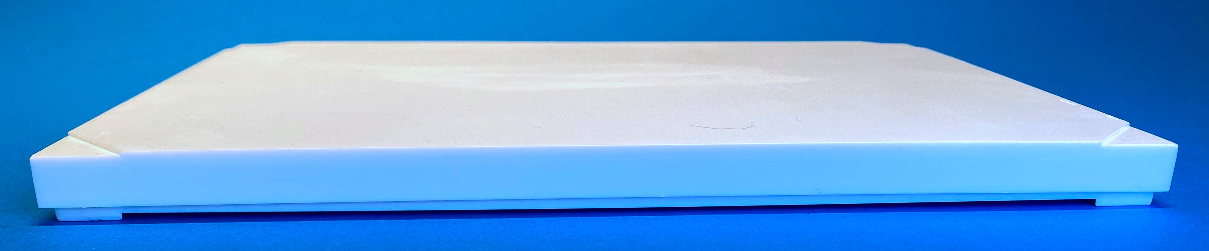FTC case, front detail showing small extensions on the base that fit into small depressions on the top to help stack
