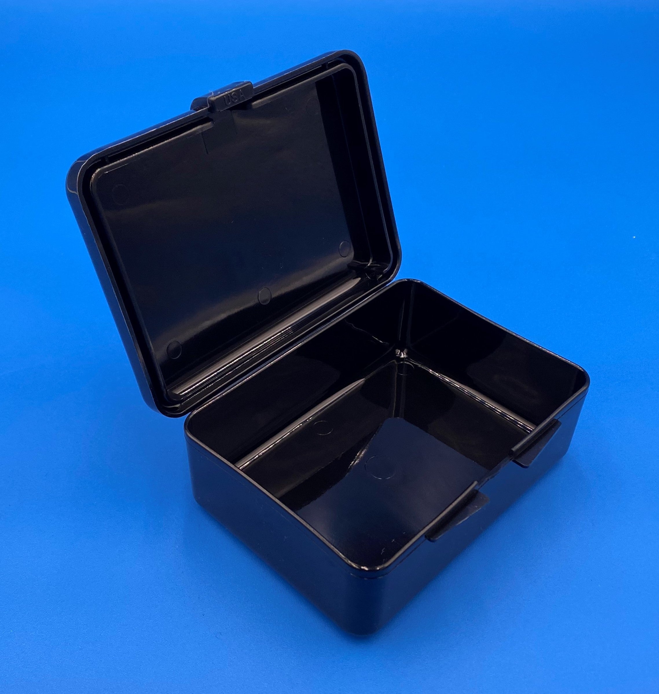 SPC molded in black polypropylene, open
