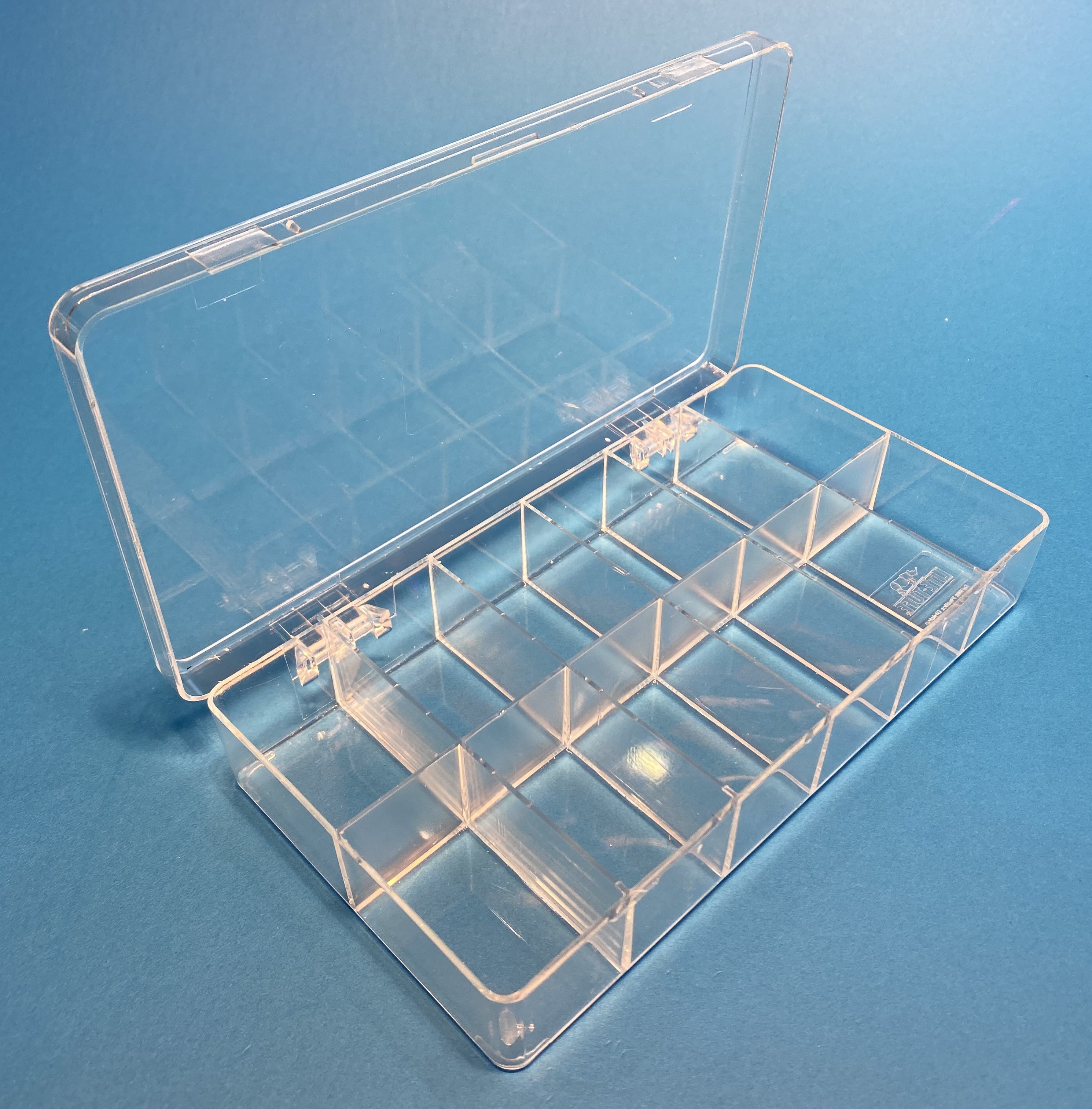 D26 case, 12 bays, molded in clear impact-protected copolymer, open