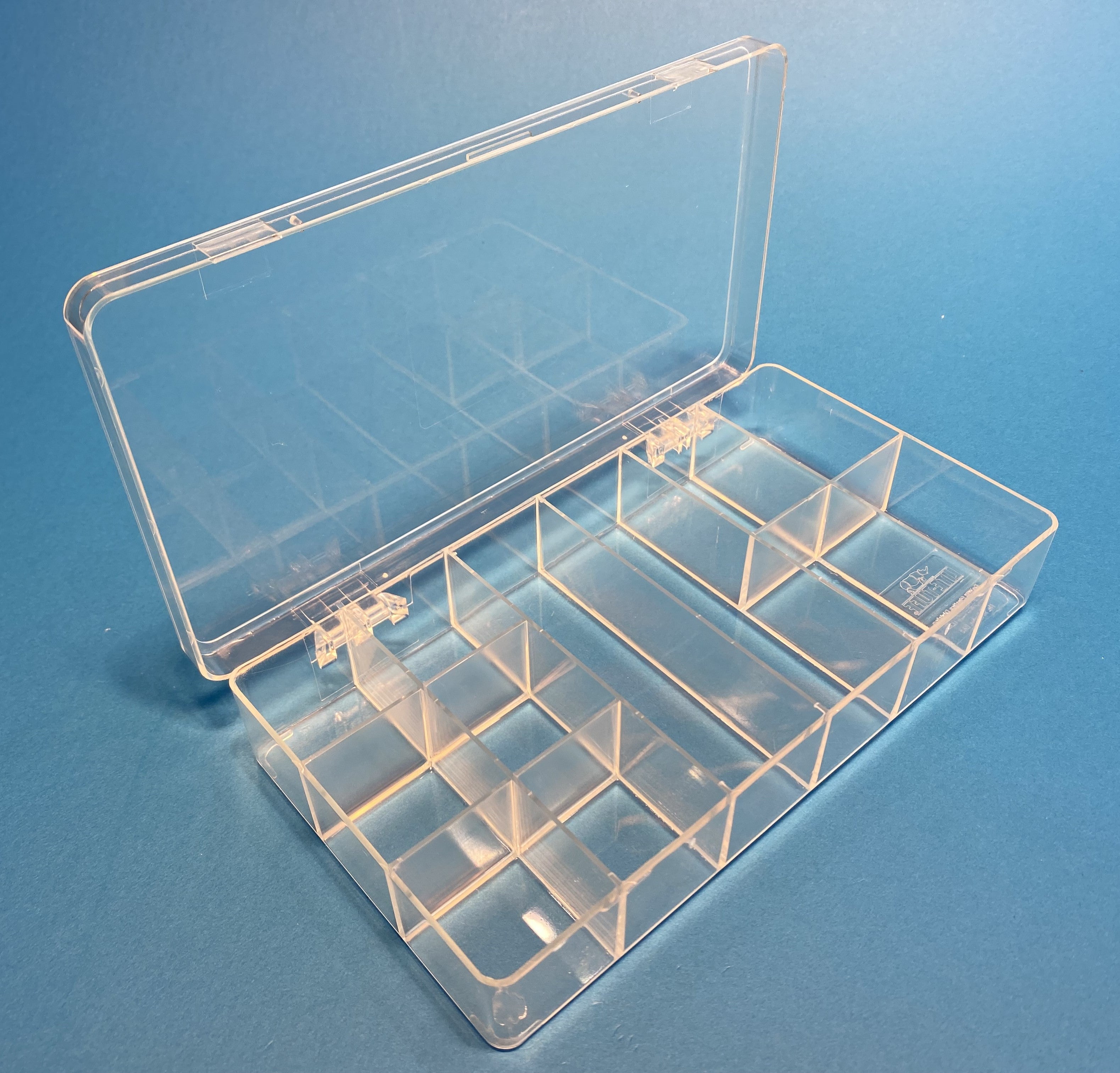 D26 case, 12 bays in configuration 2, molded in clear impact-protected copolymer, open