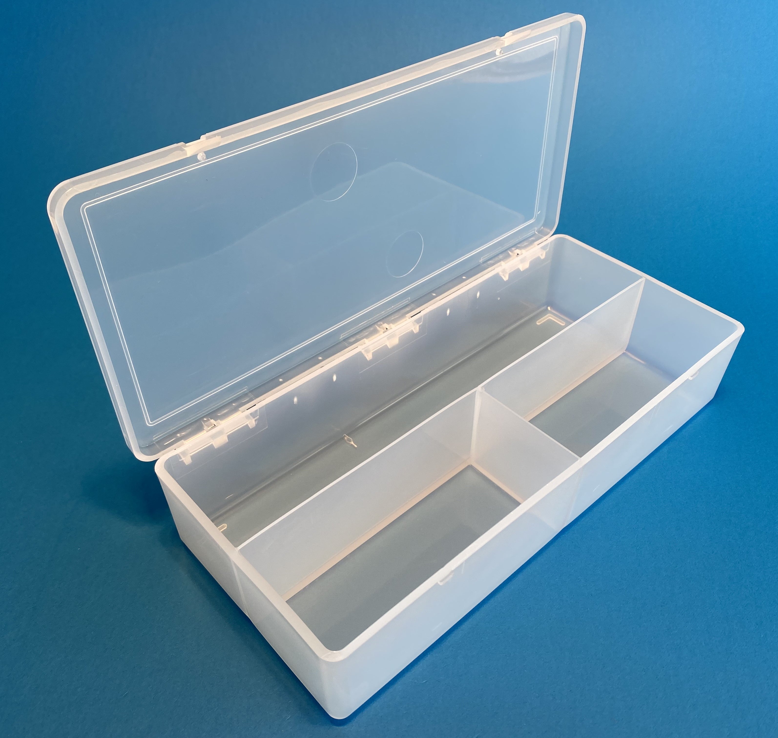 D54 case, 3 bays, with two finger holes in lid, molded in clear polypropylene, open