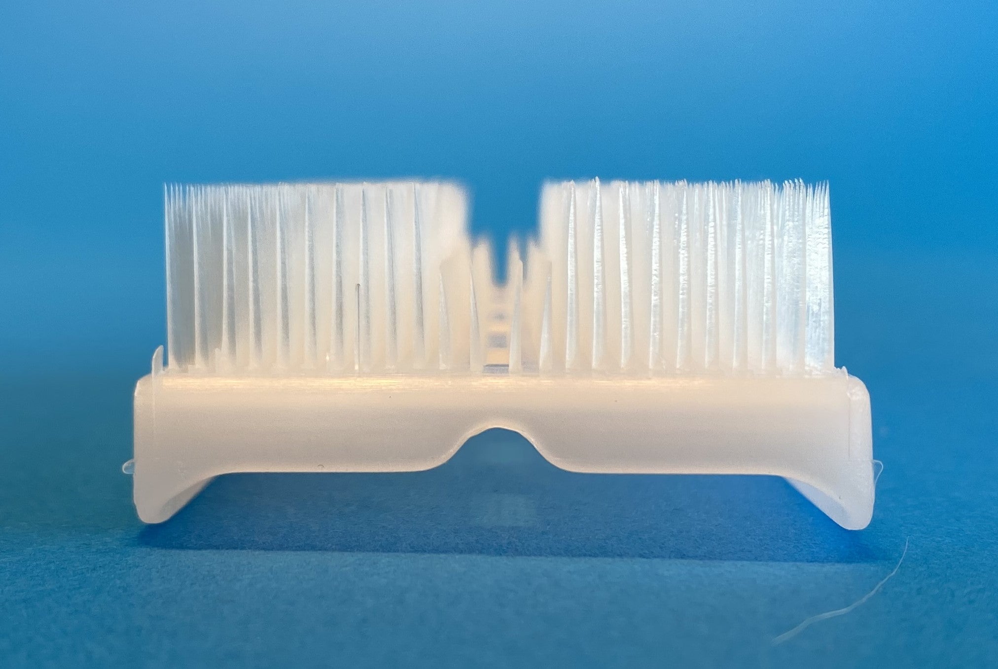Surgical-style scrub brush for hands and nails, end view