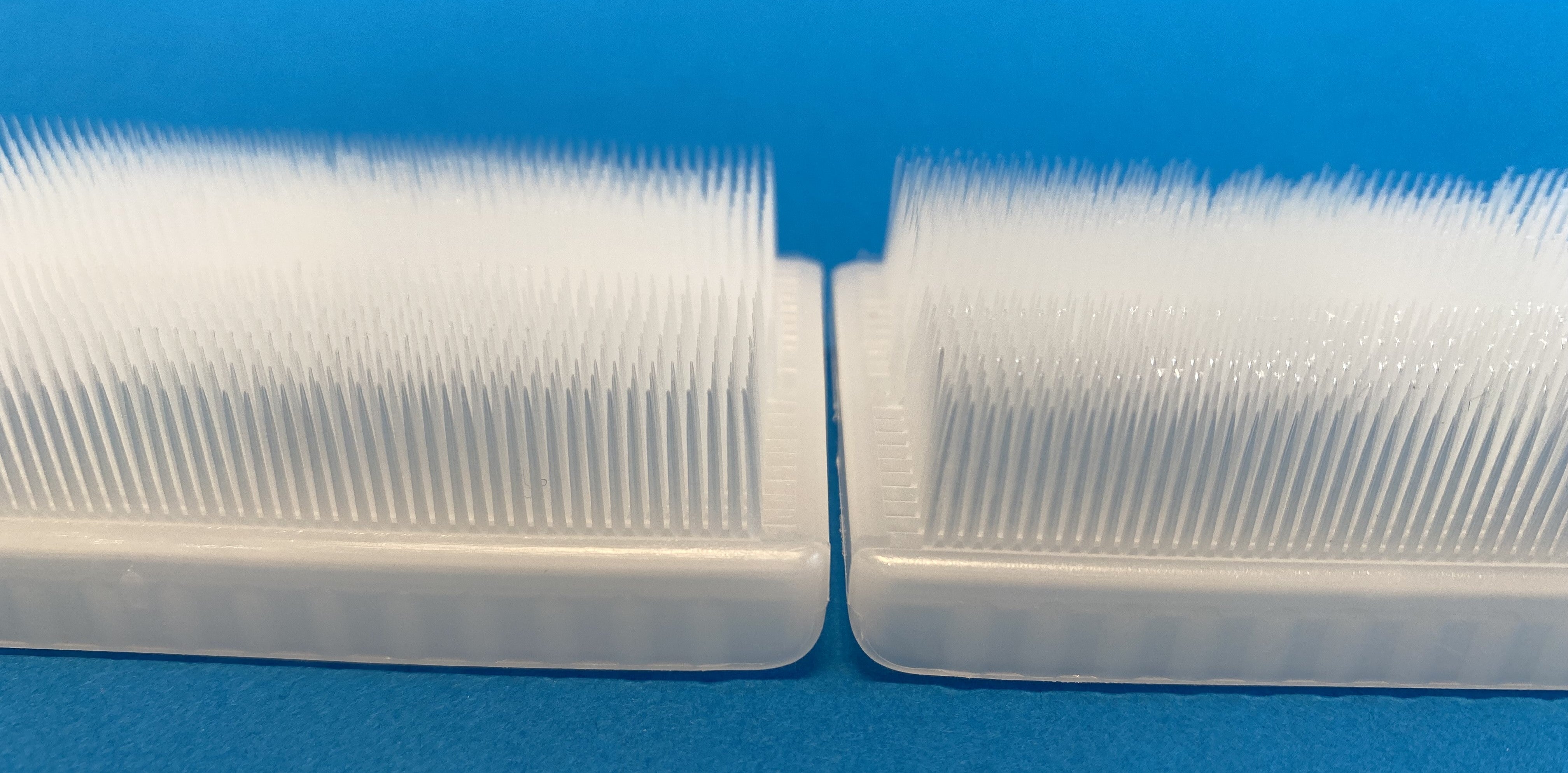 Surgical-style scrub brushes for hands and nails, two parts end to end
