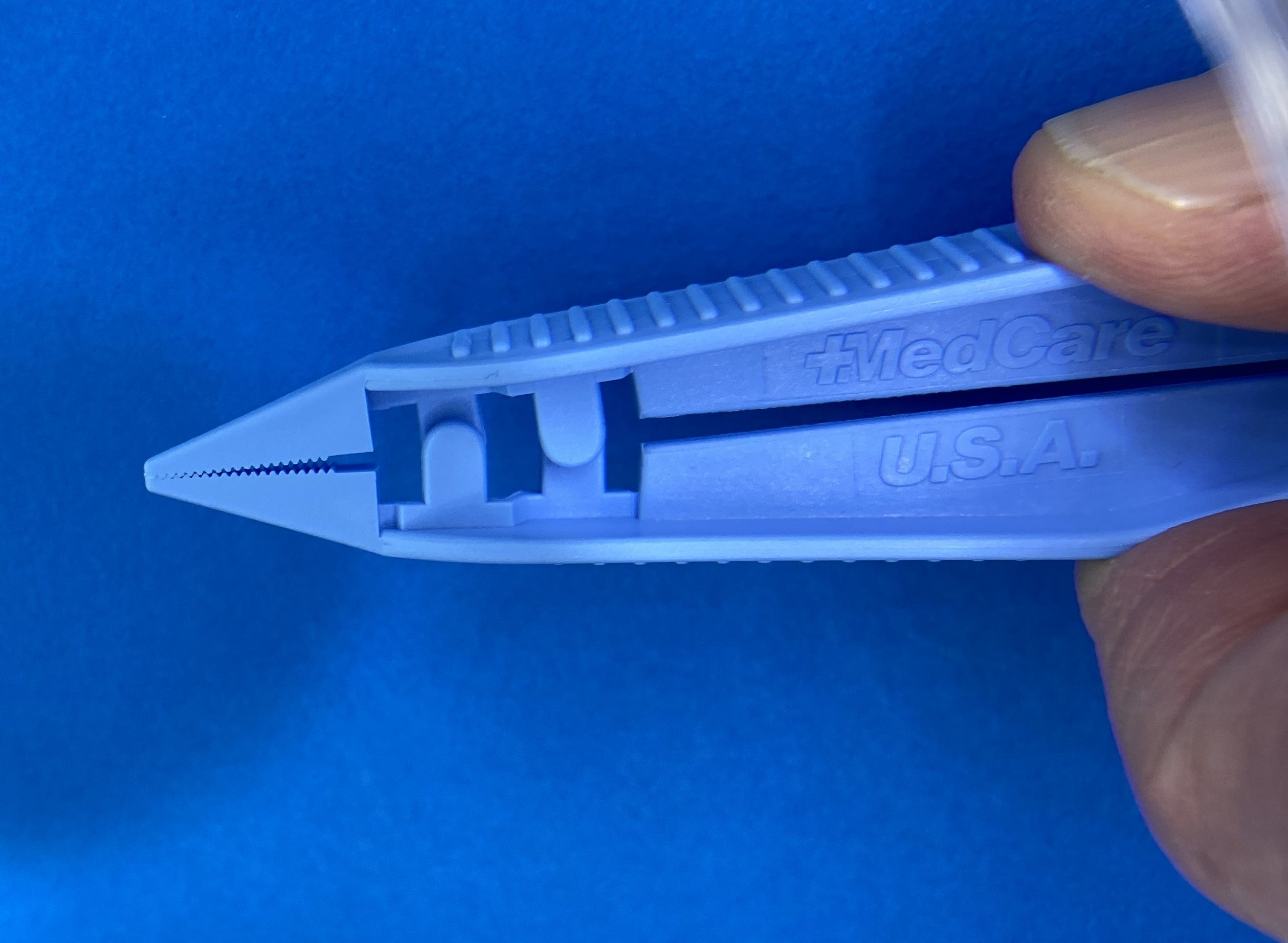 Plastic Tweezers Thumb Dressing Forceps, single item closed view 1