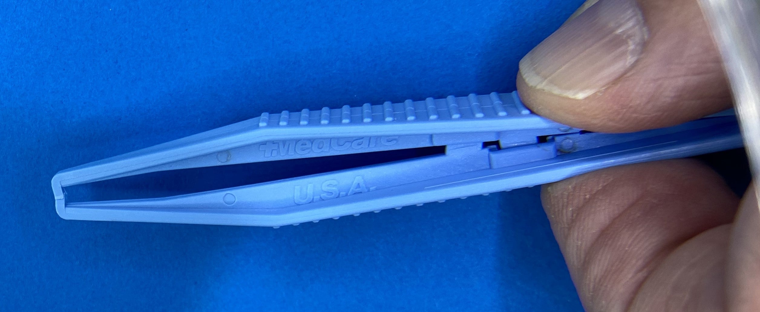 Plastic Tweezers Thumb Tissue Forceps single item closed view 1